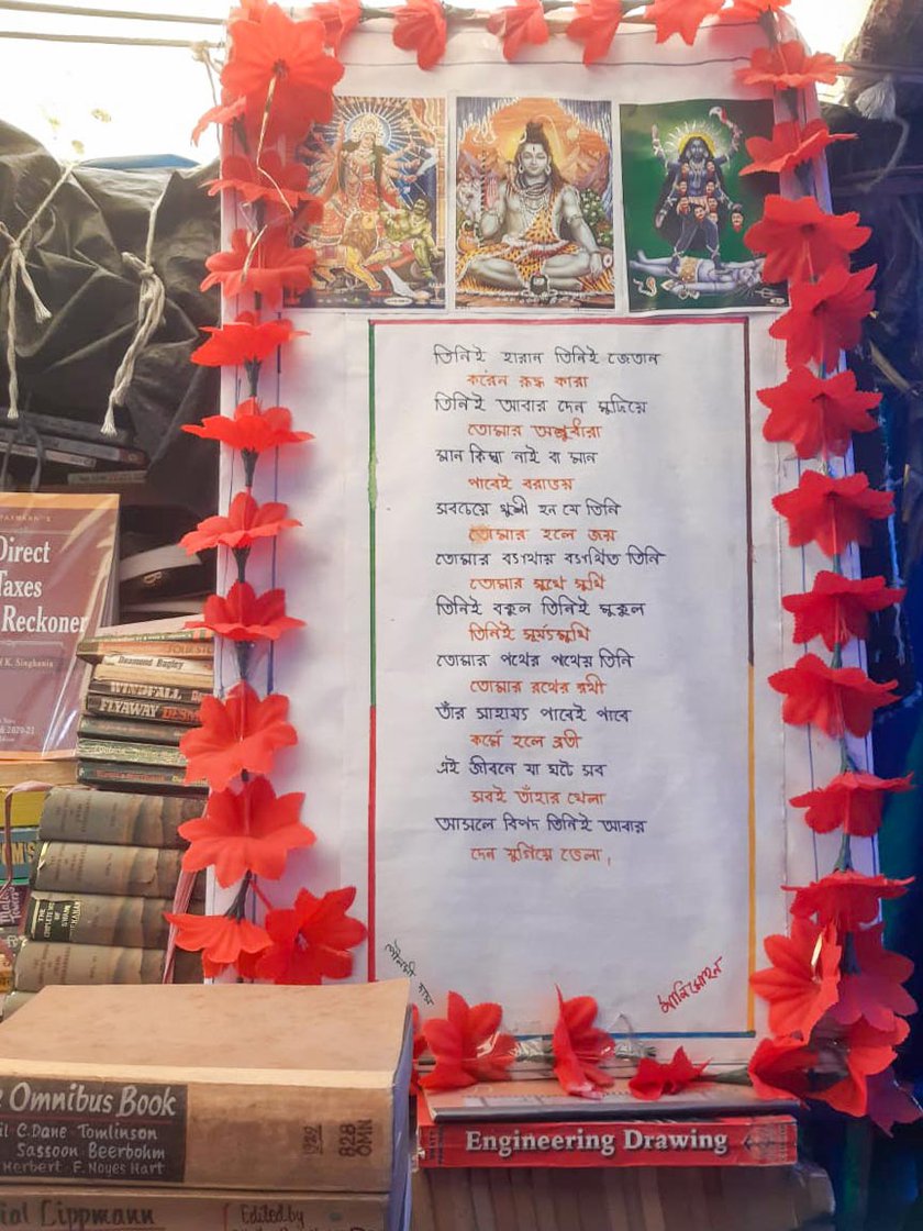 Right: A poem by Mohan Das holds a place of pride at his stall