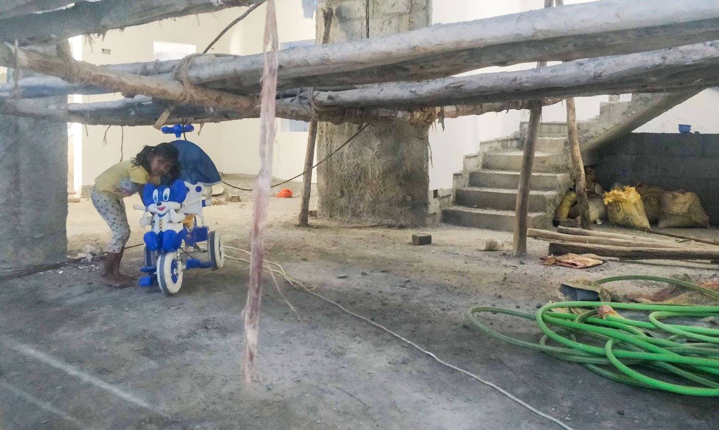 Three-year-old Rakshita is growing up moving from one building site to another
