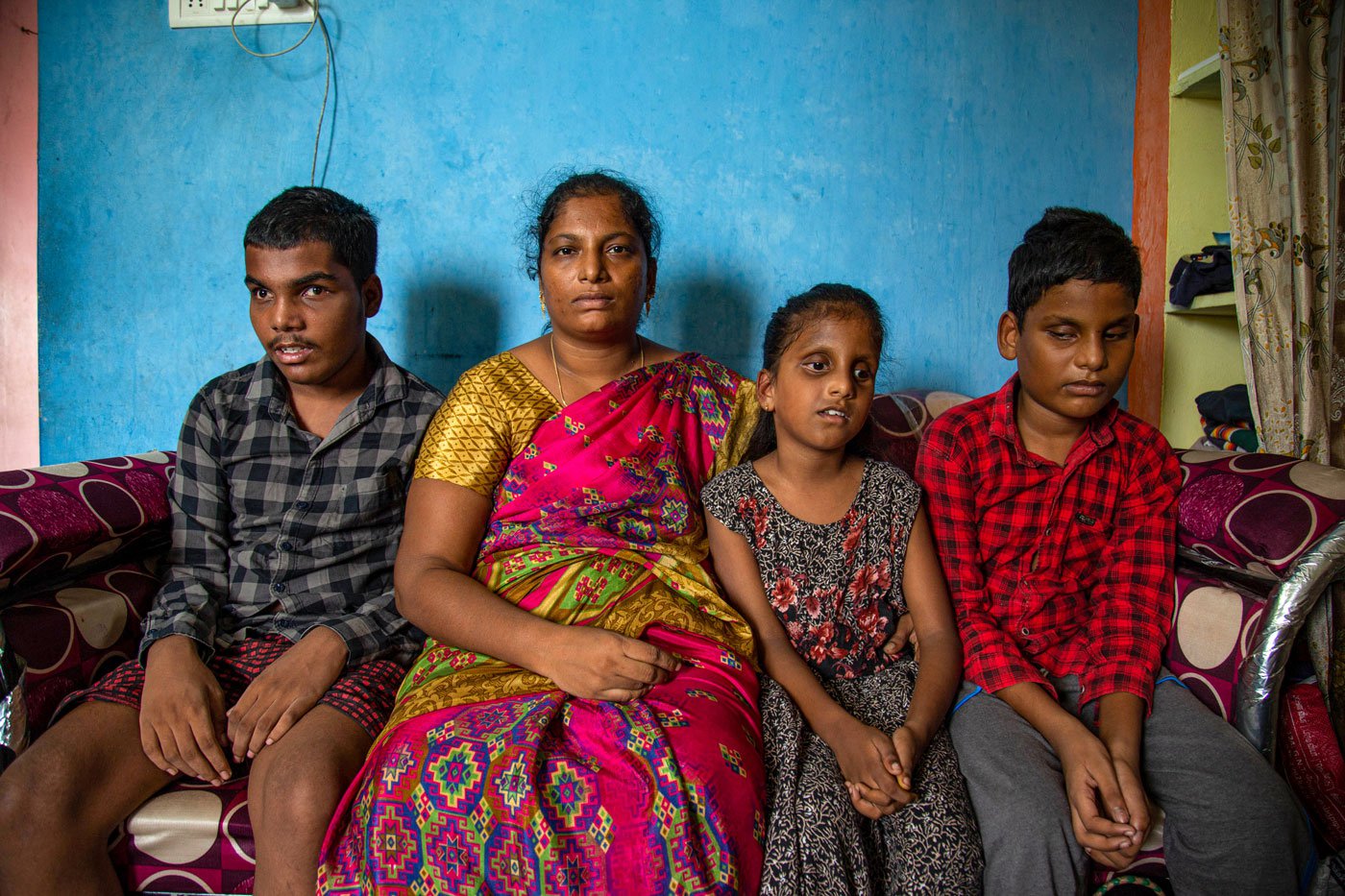 Saranya with her three children, M. Meshak, M. Lebana and M. Manase (from left to right), at their house in Gummidipoondi, Tamil Nadu