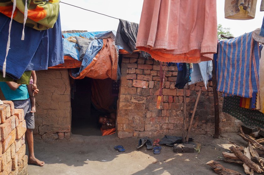 The kiln workers' makeshift huts – around 75 families from Balangir district are staying at the kiln where Hruday works