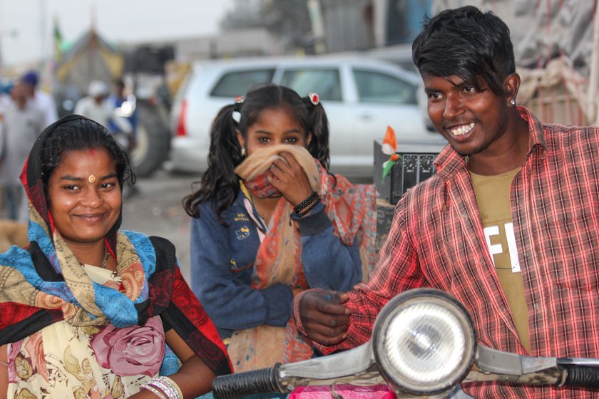 Left: Lil, Rani (centre) and Vikram moved to Singhu early this year. Right: Rani, 12, started practicing the high-wire dance when she was 3 years old