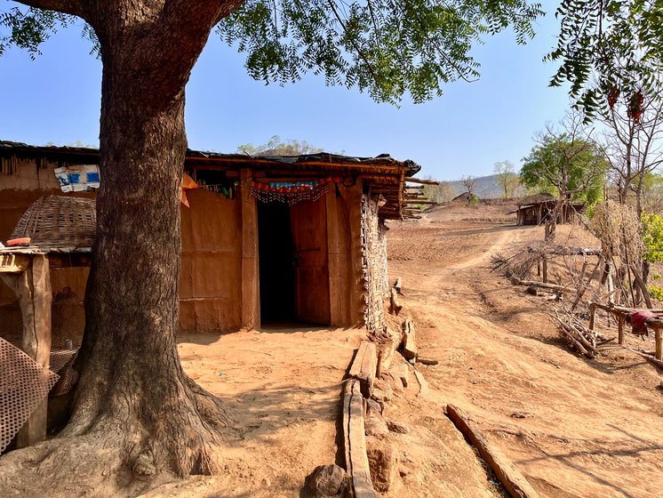 Ungya Pawara’s home (left) in the village. He is a descendant of one of the original settlers of the hamlet .