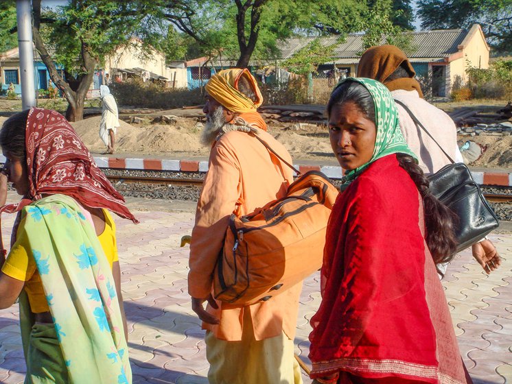 Revantabai Kamble (in red, left), Shakuntalabai and Buribai (right) spend just four hours a day at home and travel over 1,000 kms each week to earn a few rupees