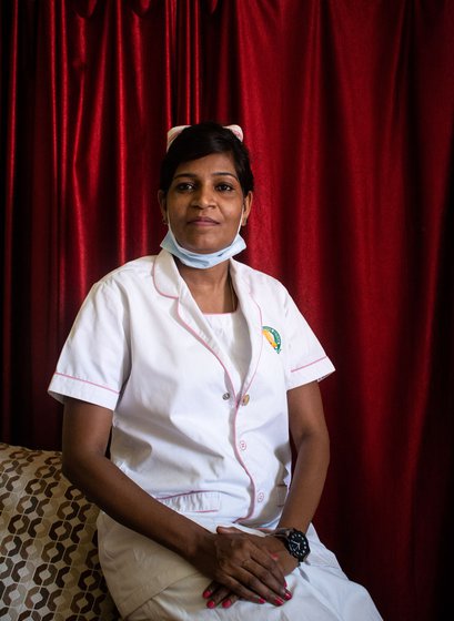 The stigma of working in a Covid ward, for nurses who are Dalits, as is Thamizh Selvi, is a double burden. Right: 'But for my husband [U. Anbu] looking after our son, understanding what my role is, this would not have been possible'