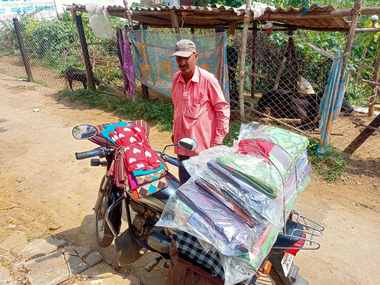 Driving a motorbike for hours in the searing heat when the temperature is 45 degrees [Celsius] is extremely tough'. (On the right is Sangam Lal, a feriwala from Tikat Kalan village, whose father, Jagyanarayan Jaiswal, is featured in the video with this story)