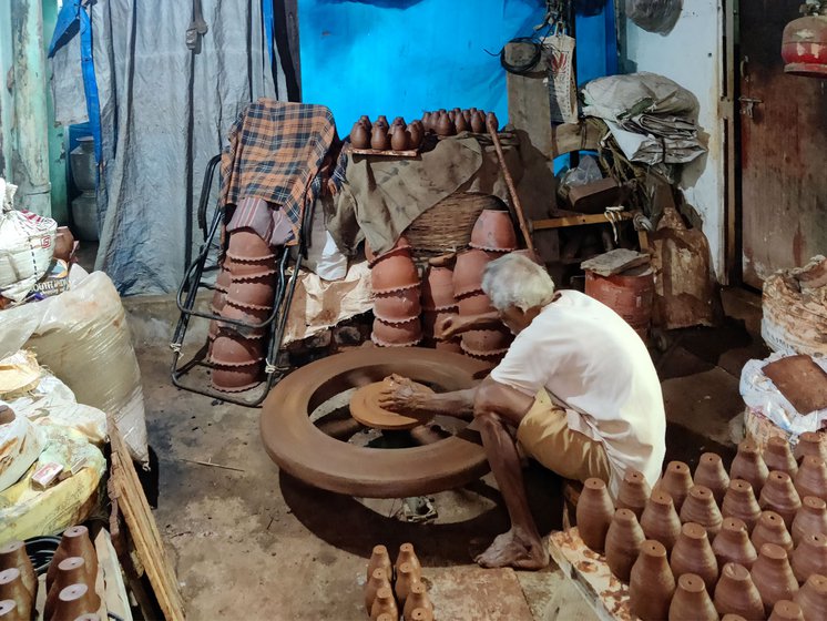 Paradesam made a 1,000 flowerpots (in the foreground) on order and was paid Rs. 3 for each. These are used to make a firecracker by the same name.