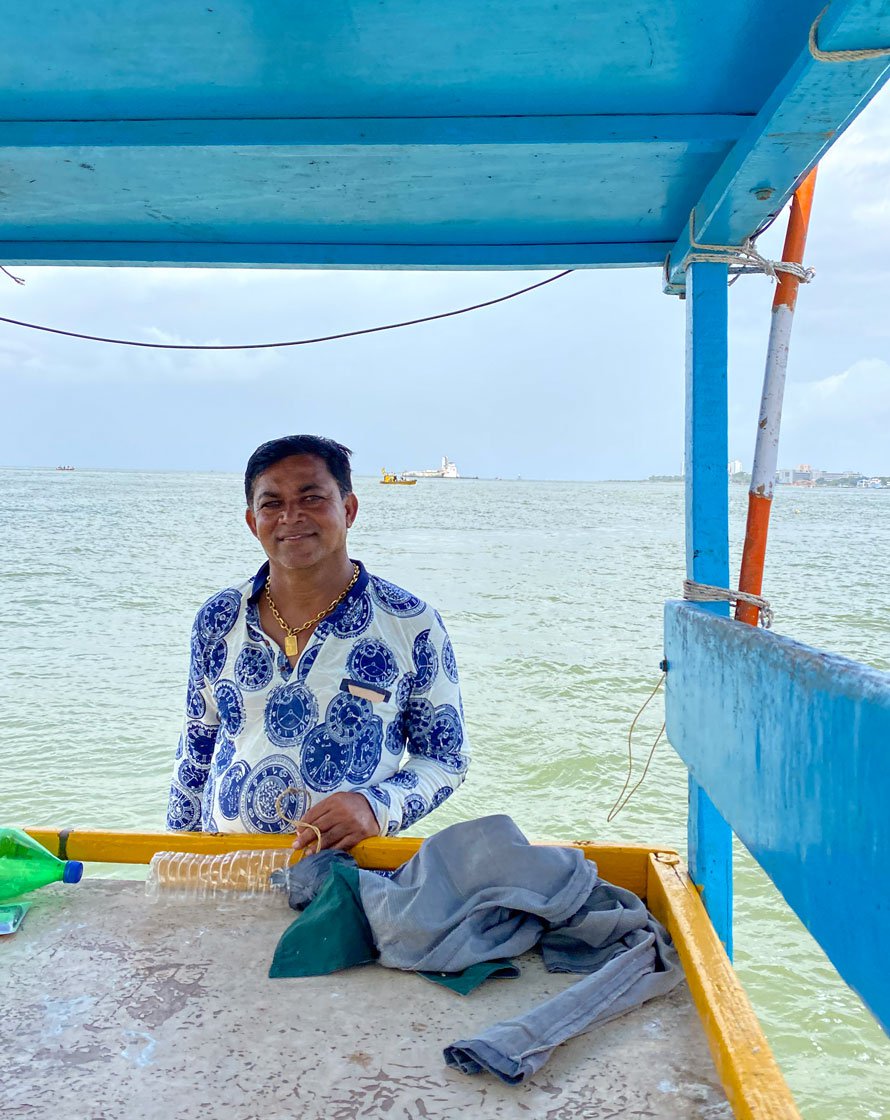 Dilip Koli holding a crab: “During a crisis, farmers at least get some compensation from the government. But fishermen don’t get anything even though farmers and fishermen are both like brothers.”