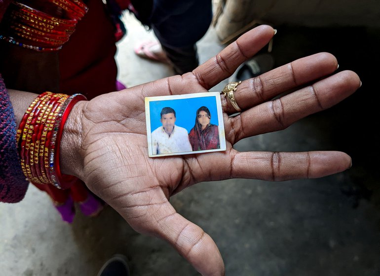 Prabhabati shows a photo of her and Mukesh.