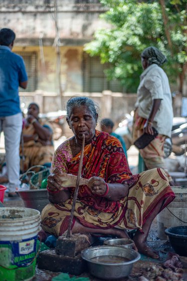 Kala has been cutting fish for the last 15 years. Before this she was a fish vendor for two decades. ' It was my mother-in-law who introduced me to fish vending soon after I moved to my husband’s village at Kinjampettai as a young bride.'