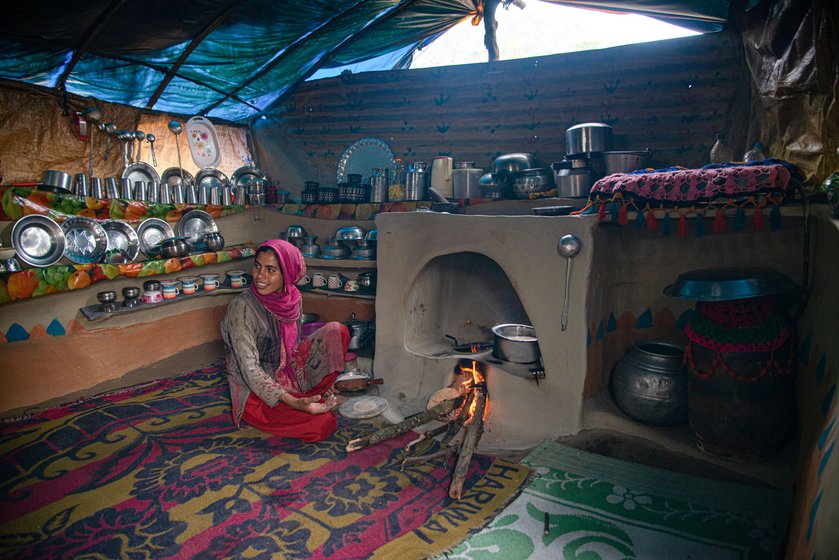 Left: Nageena, who belongs to the Bakarwal community, is cooking in her house.