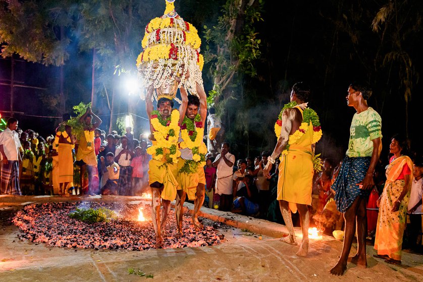 Right: Brothers, G. Chinnadurai and G. Vinayagam carry the poo-karagam , which is a large milk pot decorated with flowers