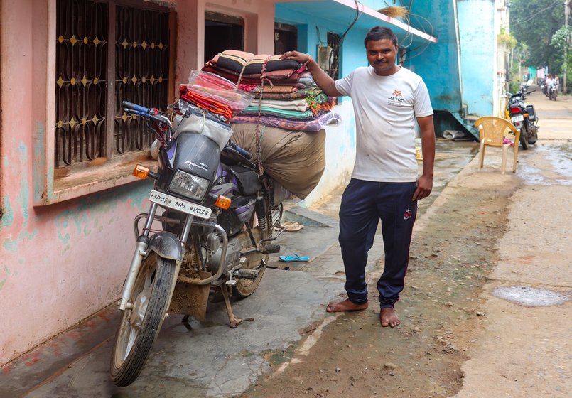 Driving a motorbike for hours in the searing heat when the temperature is 45 degrees [Celsius] is extremely tough'. (On the right is Sangam Lal, a feriwala from Tikat Kalan village, whose father, Jagyanarayan Jaiswal, is featured in the video with this story)