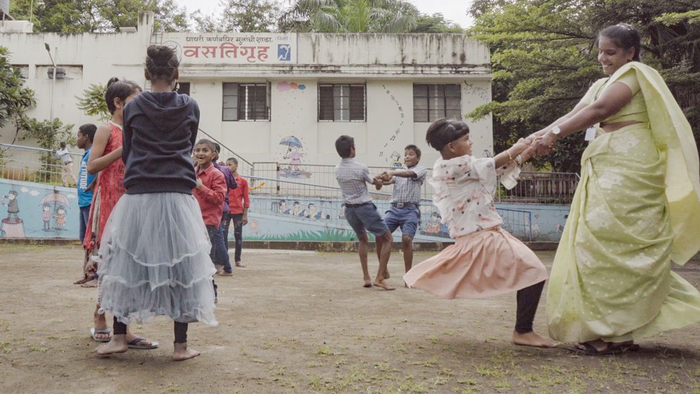 Satyabhama Alhat is a special teacher at the Dhayari School for the Hearing Impaired in Pune . She plays phugadi and other traditional games with girls and boys as they celebrate Nag Panchami. ‘A teacher at a residential school like ours is also a parent,' she says