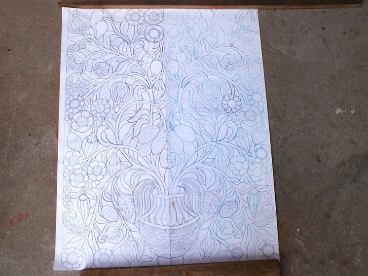 He draws his designs on butter paper before carving them on the wood. These papers are safely stored for future use