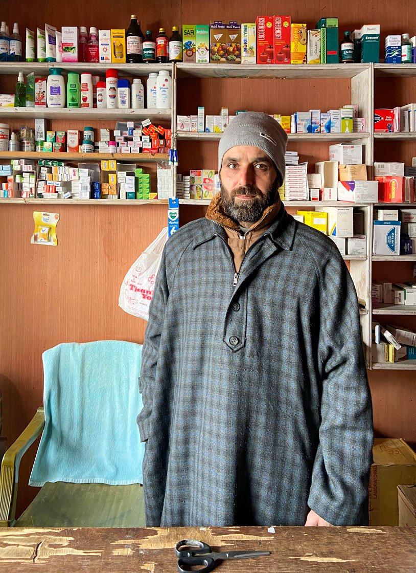 Left: Mohammad Sidiq Chachoo, who sells leather goods to tourists, says, 'We prefer these clinics because they are nearby and have medicines readily available'. Right: The chemist-clinic he is visiting is run by Bilal Ahmad Bhat