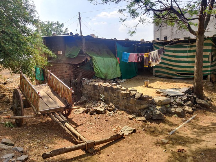Sunita Magar and her home in Pandharyachiwadi village. She borrowed money to buy remdesivir vials from the black market for her husband's treatment