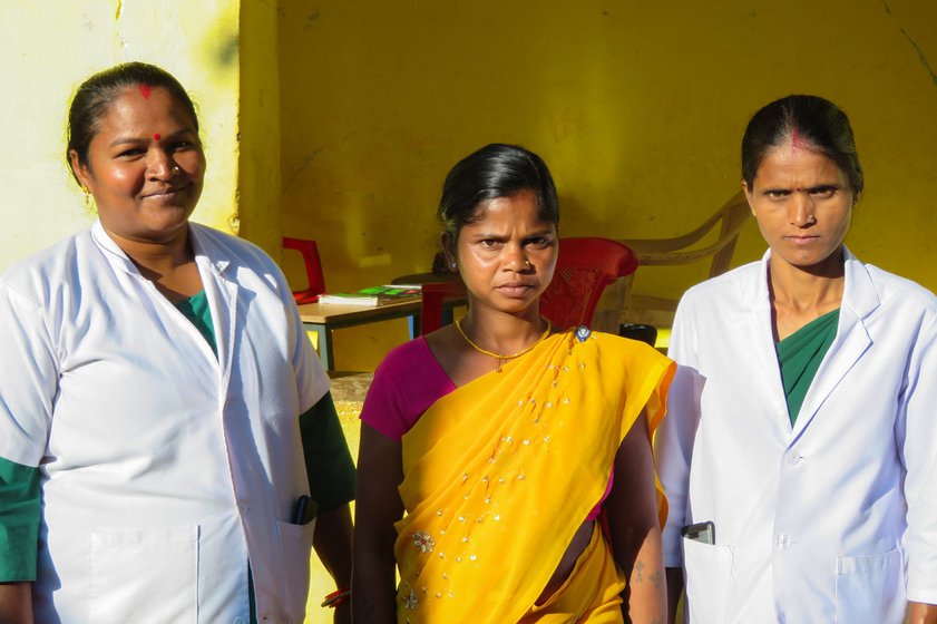 Once a month the Naumunjmeta school doubles up as an outpatient clinic for Urmila, Manki (middle), Savitri Nayak and other healthcare workers