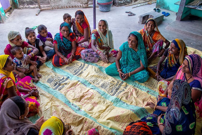 Kalpana Rawal (blue saree) is leading a women’s group in her village to promote women’s health
