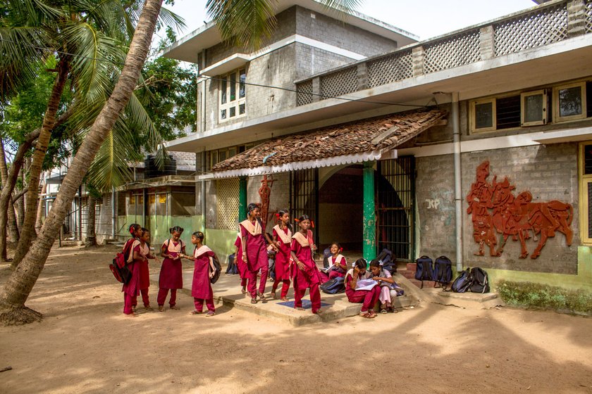 Prema Revathi (left) with some of Vanavil's residents. Most of the school's students have been sent home, but a few remain on the campus (file photos)

