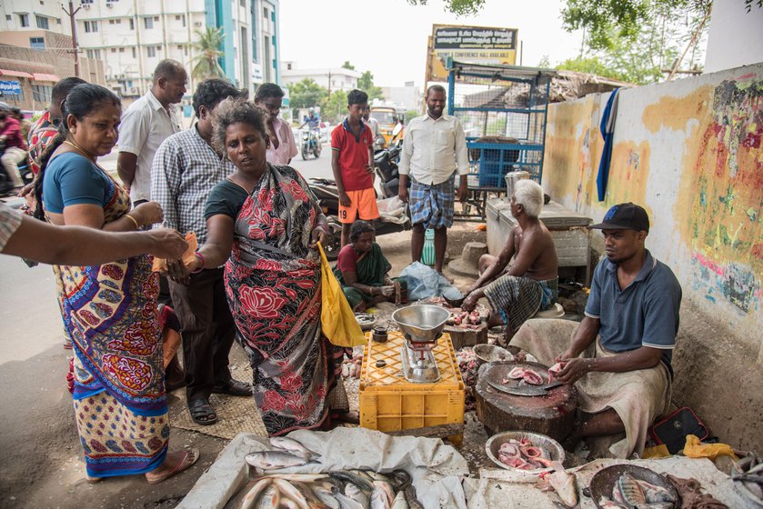 My mother selling fish by the roadside. Each time the government expands the road, she is forced to find a new vending place for herself