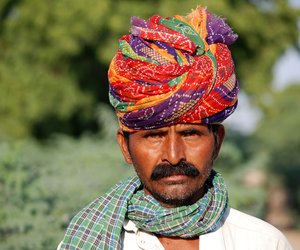 Man wit a colourful headgear