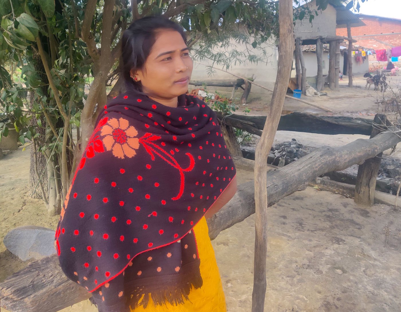 Mansarovar outside her house in Kajariya. In January, she walked through the forest with her infant son to reach Geta Eye Hospital across the border. "No hospital in our district is as good as Geta for eye care," she says