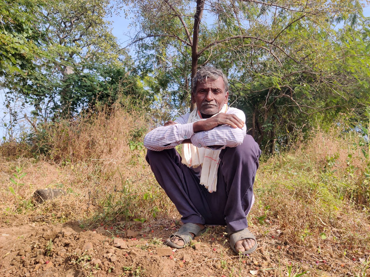 Shankar Pantangwar on his farmland in Hatgaon, where he cultivates cotton and tur on his three acre. He faced severe losses for two or three consecutive seasons