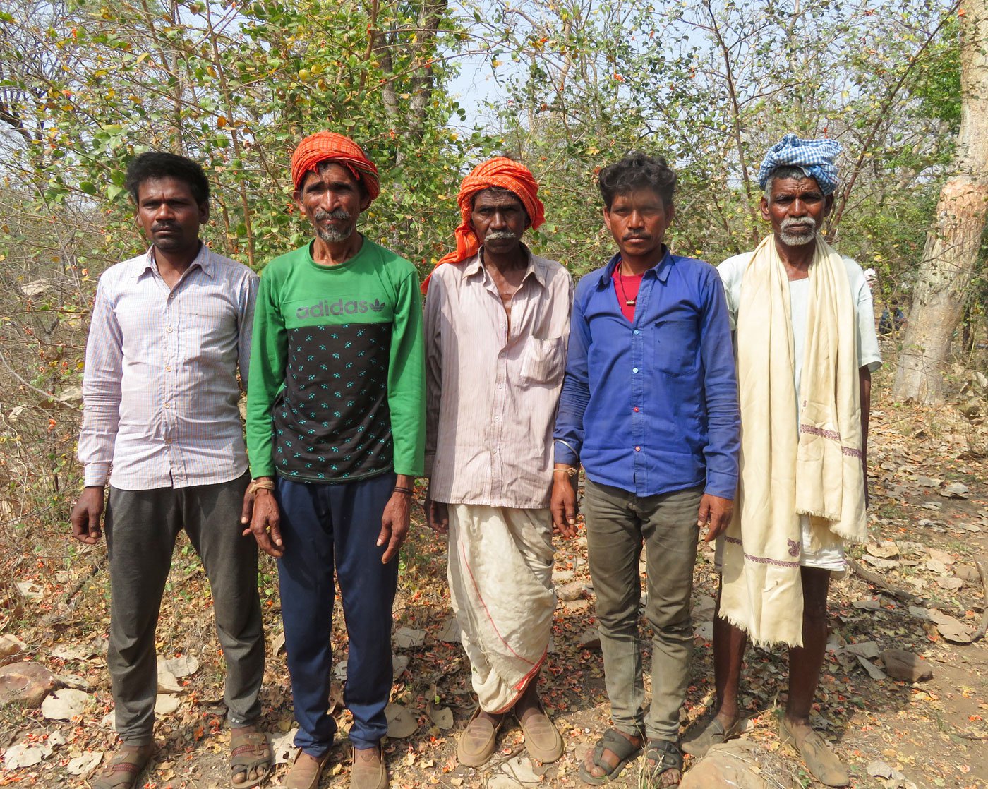 Residents of Bagcha (from left): Mahesh Adivasi, Ram Charan Adivasi, Bachu Adivasi, Hari, and Hareth Adivasi. After relocation to Bamura village, 35 kilometres away, they will lose access to the forests and the produce they depend on