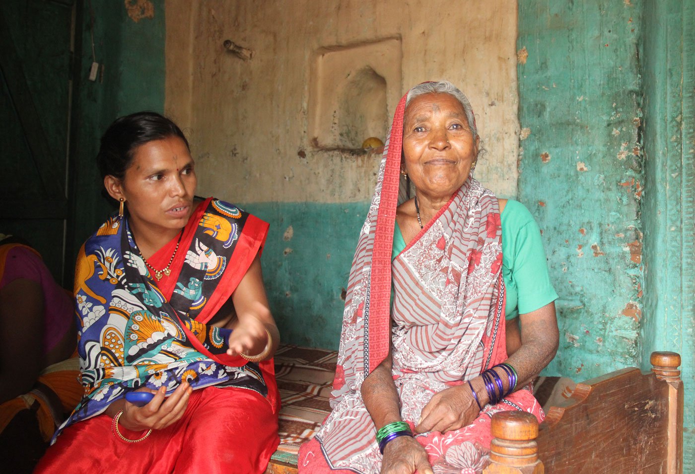 Bortyakheda’s ANM Shanta Durve (left) urges Charku, the village's elderly dai, to come along even for deliveries the PHC