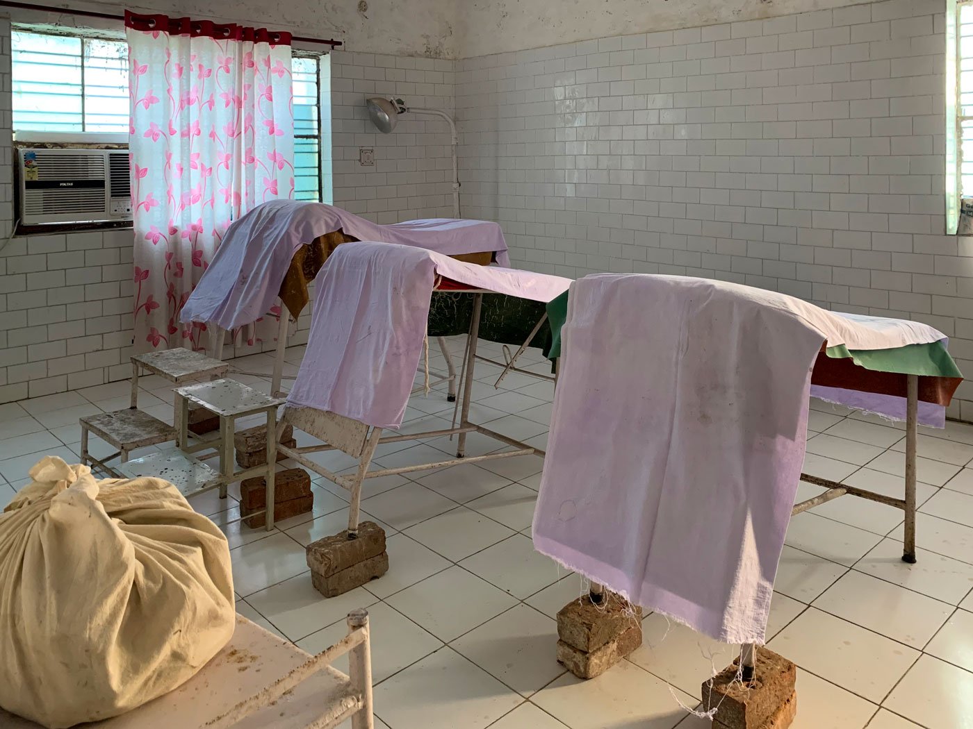 An 'operation theatre' at a CHC where the sterilisation procedures will take place, with 'operating tables' tilted at an angle with the support of bricks to help surgeons get easier access during surgery