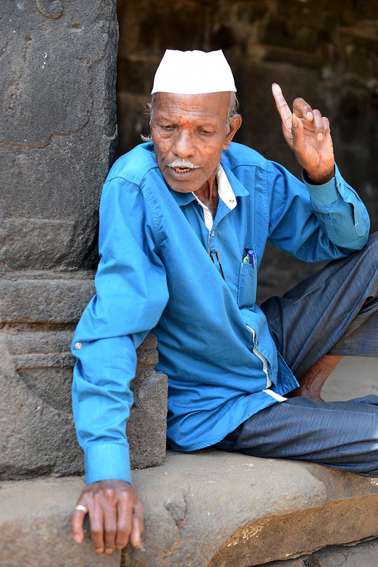 Man sitting outside the temple