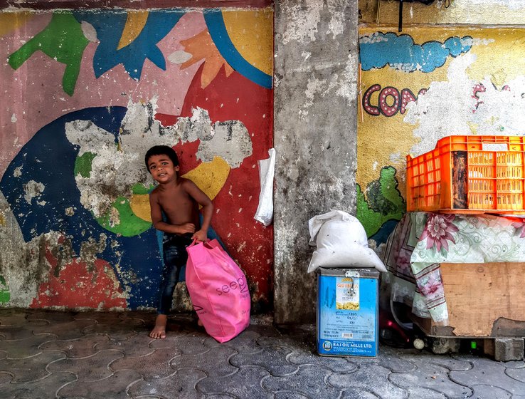 Siddharth – here, with his son Akshay – used to work at construction sites. 'That stopped when the lockdown began', he says