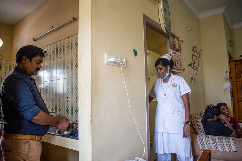 The stigma of working in a Covid ward, for nurses who are Dalits, as is Thamizh Selvi, is a double burden. Right: 'But for my husband [U. Anbu] looking after our son, understanding what my role is, this would not have been possible'