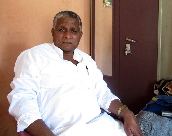 Keshav Kamble sitting on a chair in a room