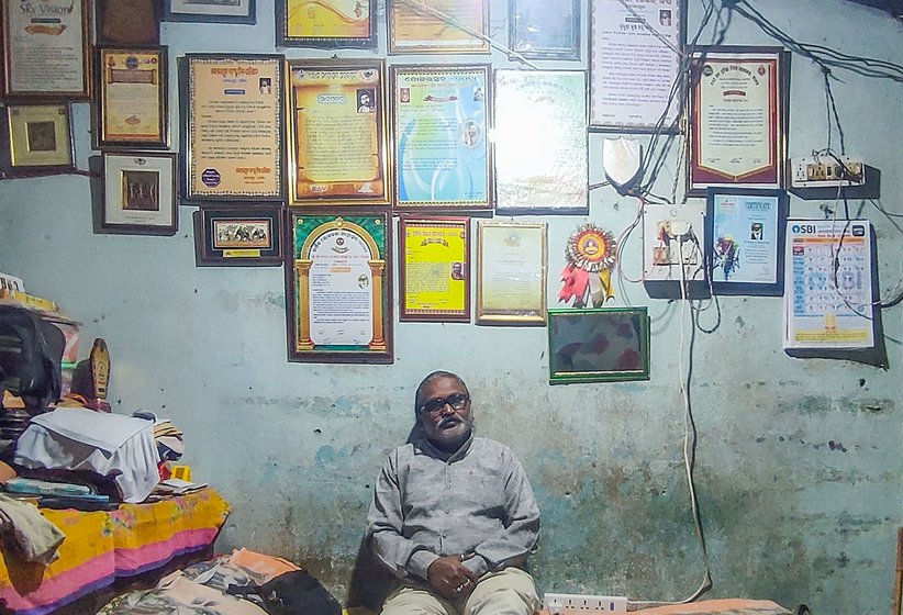 Left: Krushna Chandra Bagh with all his awards.