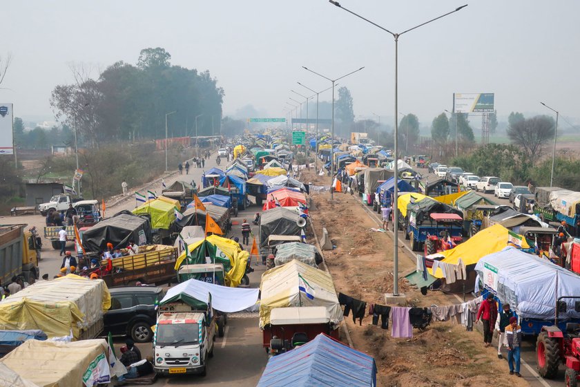 Left: Farmers have come to the protest prepared with their trolley houses.