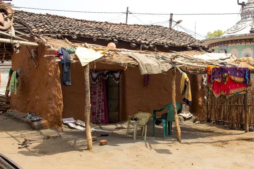 Left: The two kachha houses in which the family of late Nrupa Majhi live.