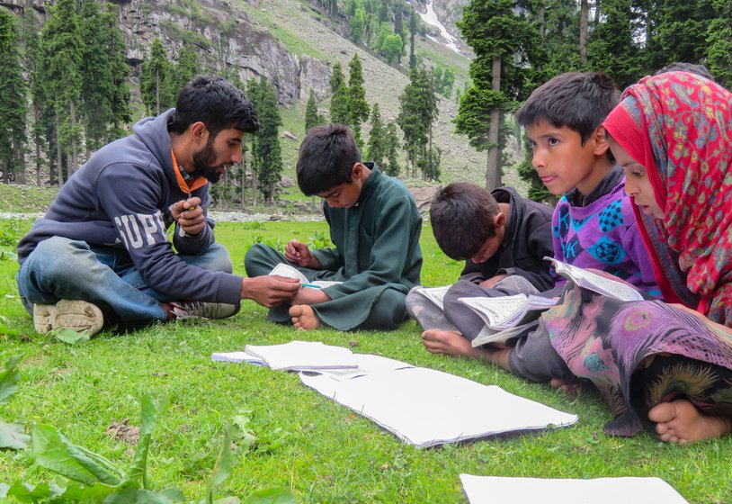 Ali Mohammed (left) is a travelling teacher who will stay for four months up in the mountains, making sure his students are up to date with academic requirements. The wide open meadows of Lidder valley are much sought after by pastoralists in their annual migration