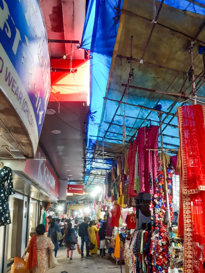 Left: The lane outside Mohan’s stall. The Gariahat market is a collection of both permanent shops and makeshift stalls.
