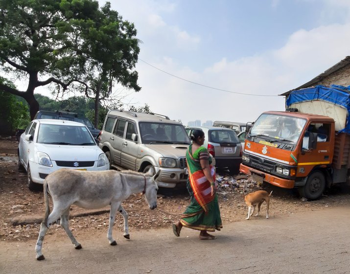 Jayshri and Sukhdev start out around 7 a.m. with Kajol or Rani, and go to various slum colonies and chawls looking for customers

