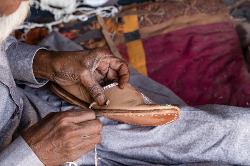 'I always start by stitching the upper portion of the jutti from the tip of the sole. The person who manages to do this right is a craftsman, others are not',  he says.