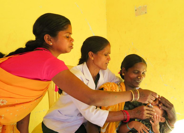 Savitri pricking Suhani’s finger for the malaria test. Right: Manki, Savitri and Bejni giving bitter malaria pills to Suhani