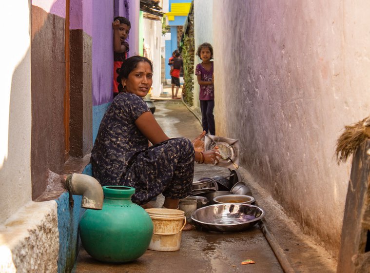 The passage in front is the only space where Gayathri can wash vessels