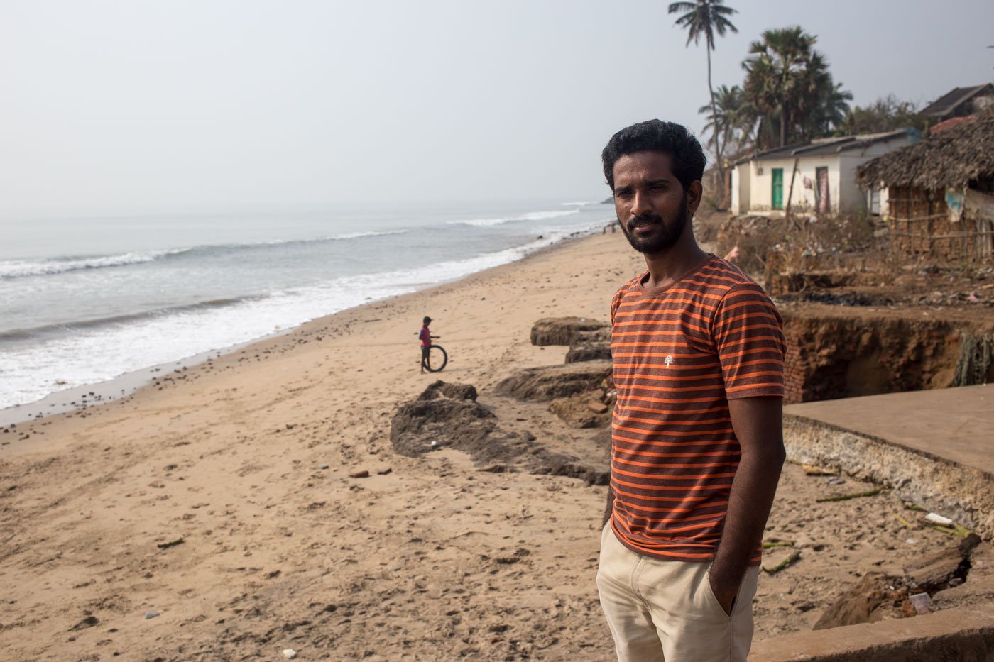 D. Prasad  grew up in the coastal village, where he remembers collecting shells on the beach to sell for pocket money. With the sand and beach disappearing, the shells and buyers also vanished, he says