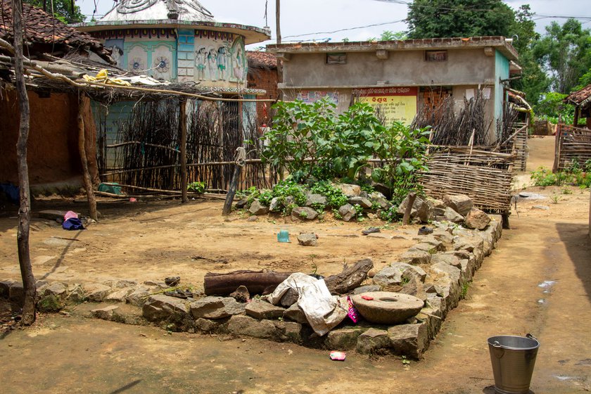 Right: These stones were purchased by Bute and her husband Gopi Majhi to construct their house under Indira Awaas Yojna, but Gopi's demise has paused that work