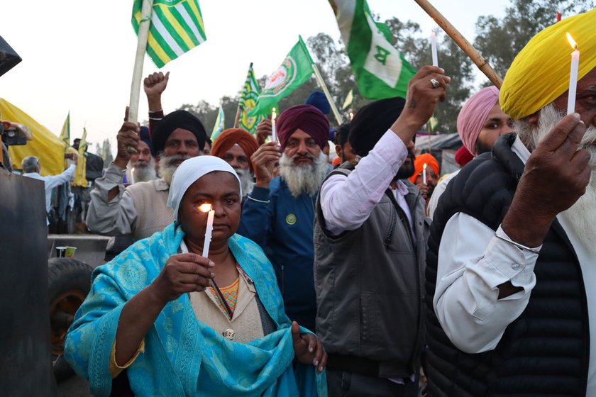 Right: Farmers hold a candle light march for 22-year-old Shubhkaran Singh who died on February 21 at the Khanauri border during the clash between Haryana police and the farmers
