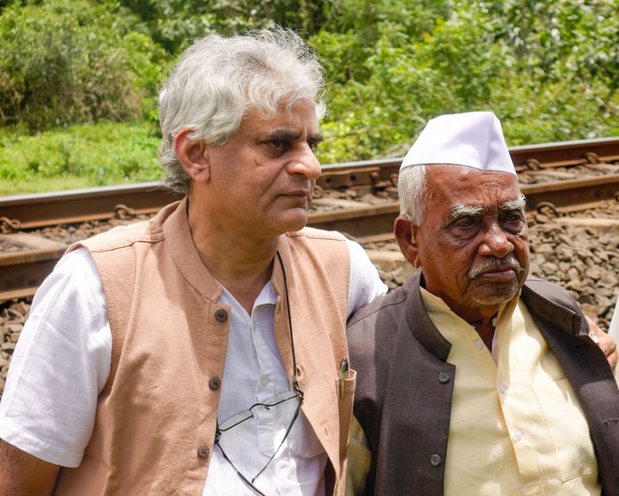 Left: Old photos of Toofan Sena and its leaders, Captain Bhau and Babruvahan Jadhav. Right: Captain Bhau with P. Sainath in Shenoli in 2016