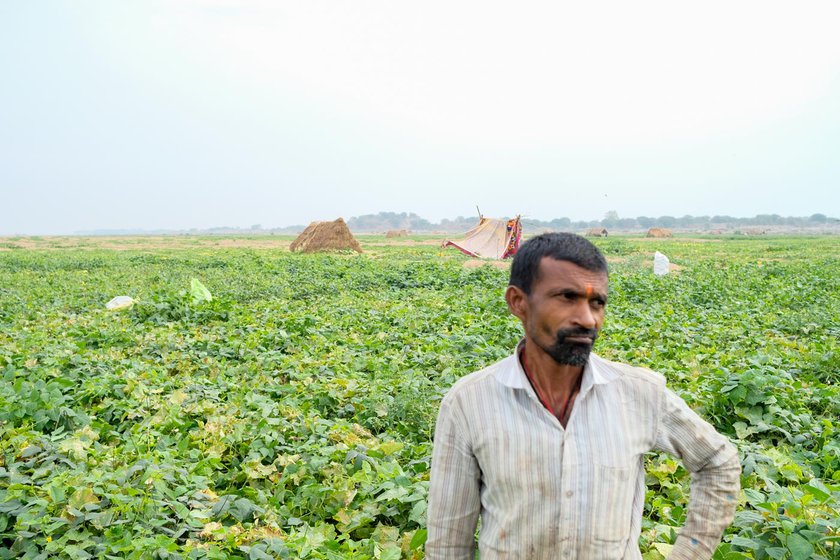 Right: Indraman Chakradhari in front of his farm