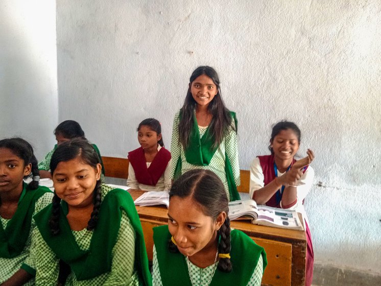Sombari with her classmates in school