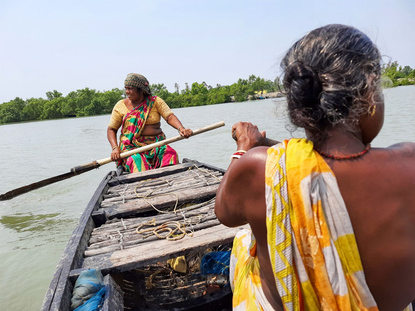 Parul and Lokhi rowing across the River Garal